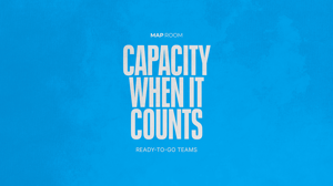 Blue graphic tile with bold white text: “Capacity When It Counts”. Subheading: “Ready-to-Go Teams.”